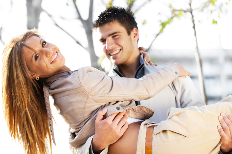 Close-up of a beautiful couple enjoying in parl.