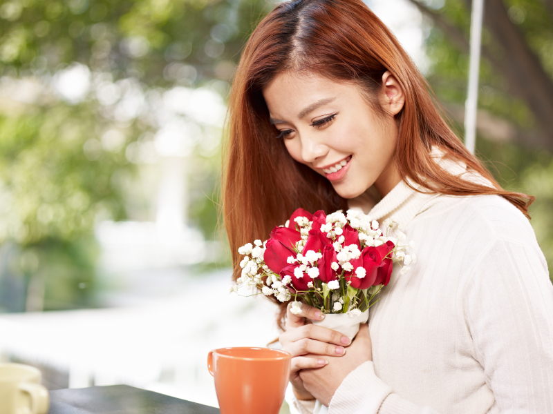 young woman with flowers