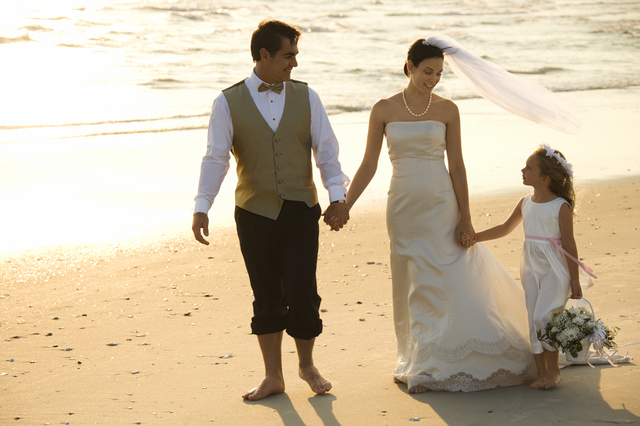 Bride, groom and flower girl.