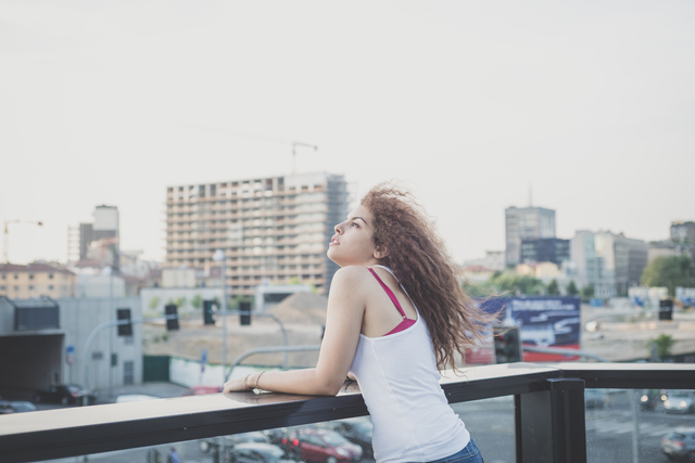 young beautiful long curly hair hipster woman