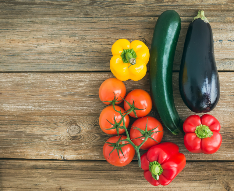 Vegetable set: ripe tomatoes, paprika, zuccini and an aggplant o