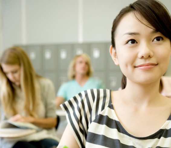 Female student studying in classroom
